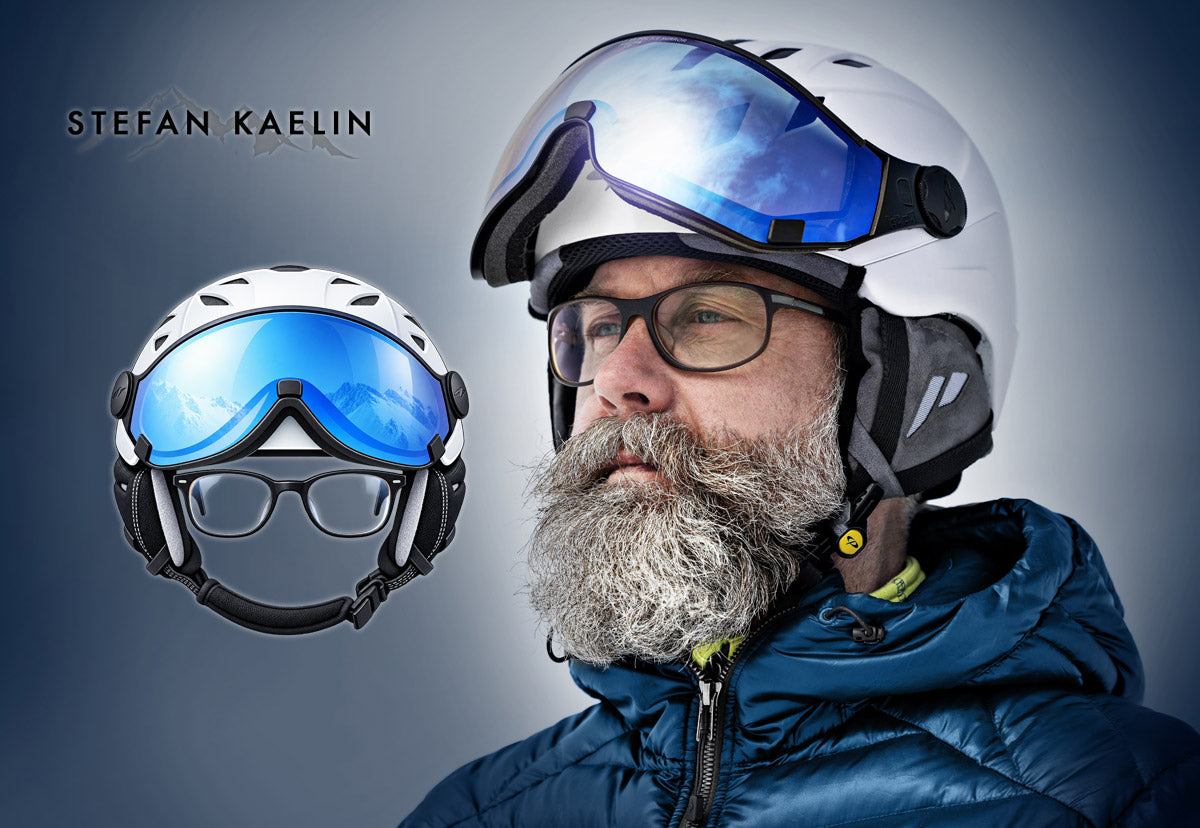 Man wearing a visor ski hemet with glasses
