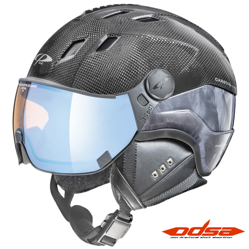 A black carbon fiber ski helmet with a clear visor showing blue-tinted mirror glass, featuring the DDSA logo on the side and a red ODSA logo watermark in the bottom right corner.