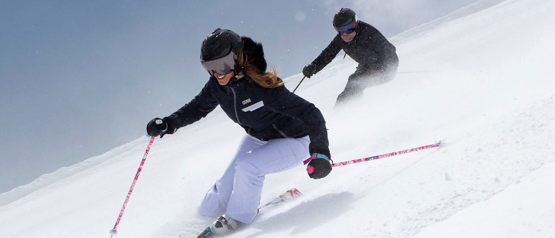 Woman wearing a black Coroa + Visor Ski Helmet from CP Sports