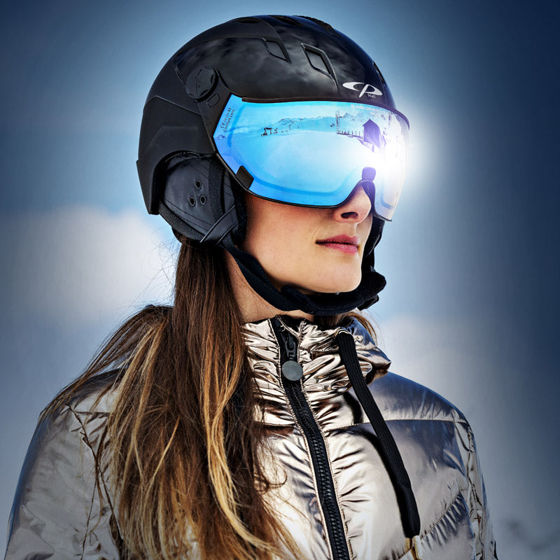 Woman wearing Camurai model visor ski helmet in black