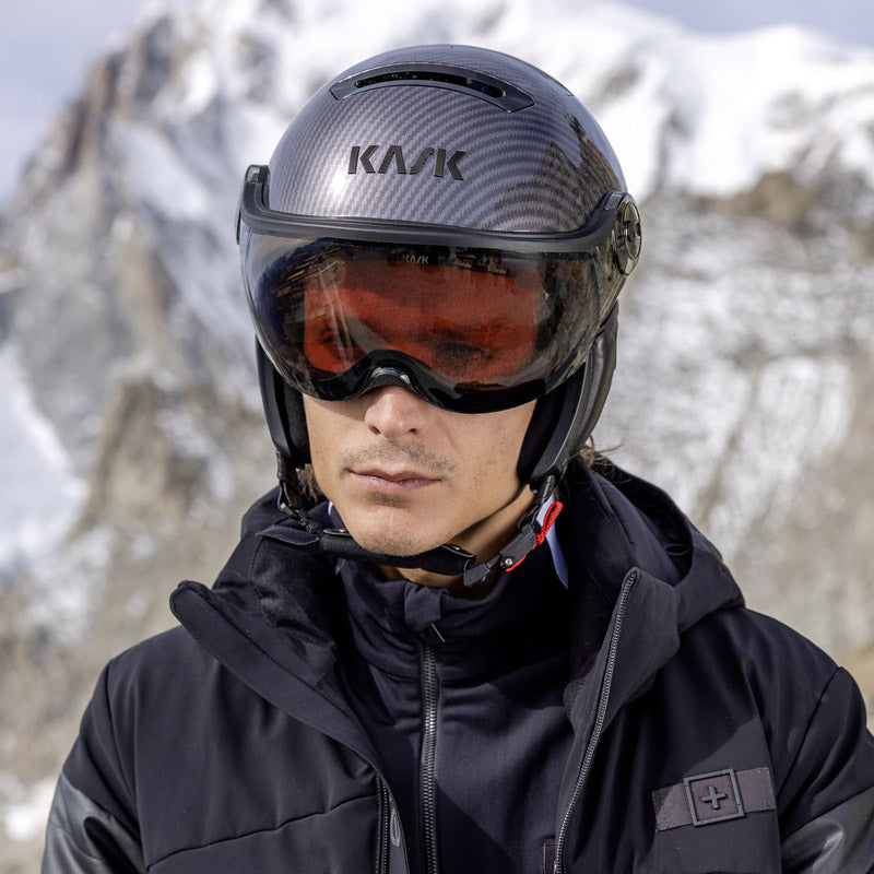 Man wearing carbon visor ski helmet from Kask